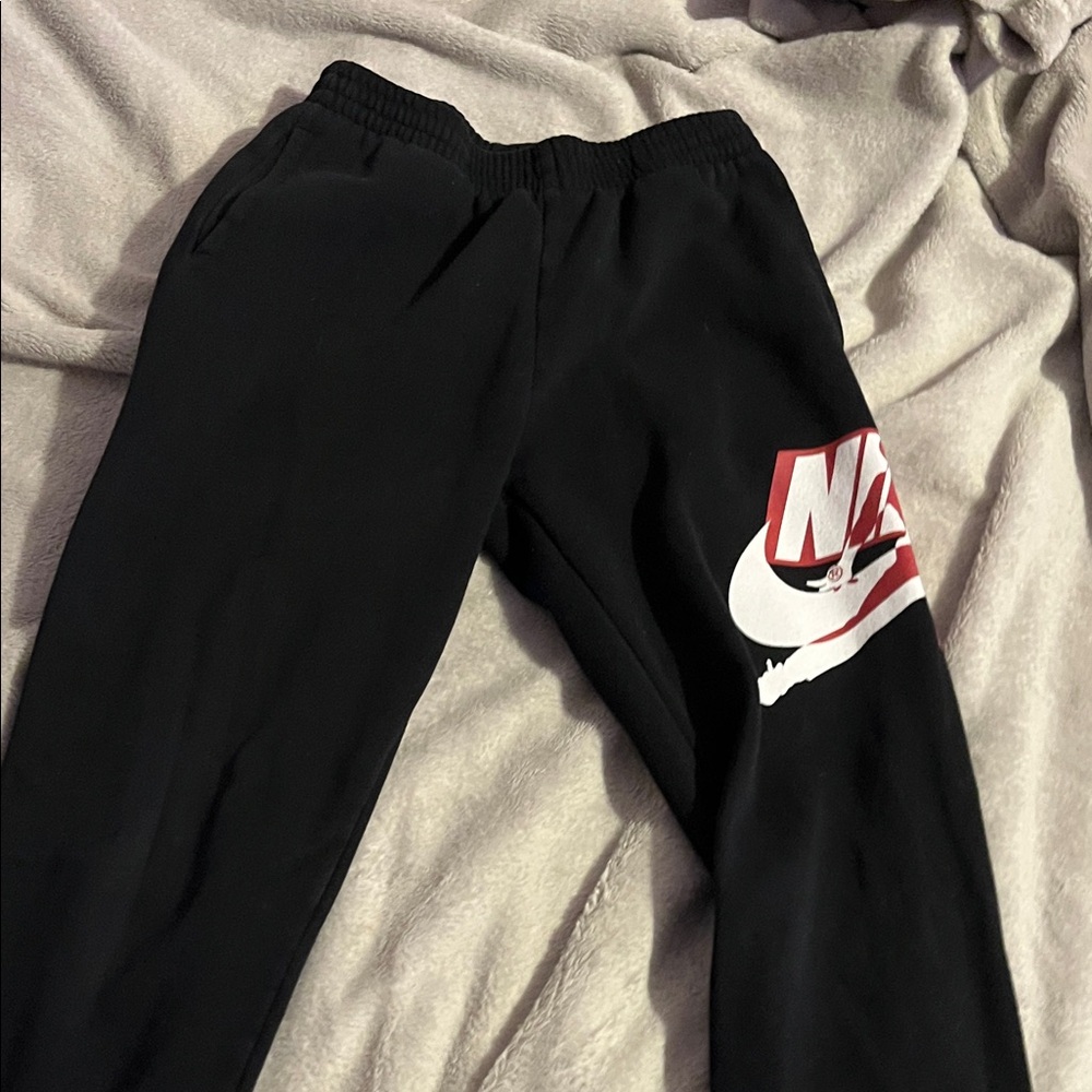 Nike Kids Black Sweatpants with Red Logo
